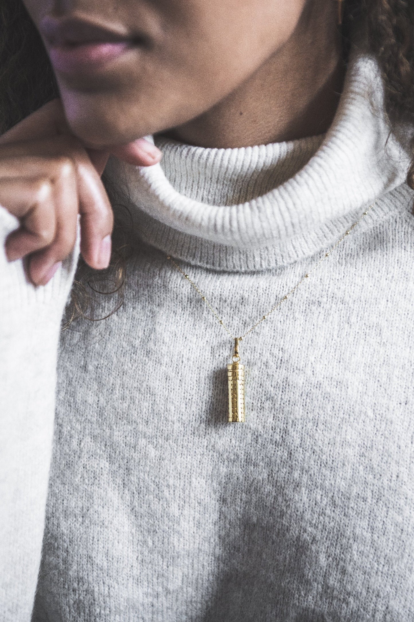 Close up of woman wearing Lexi Wishing Locket