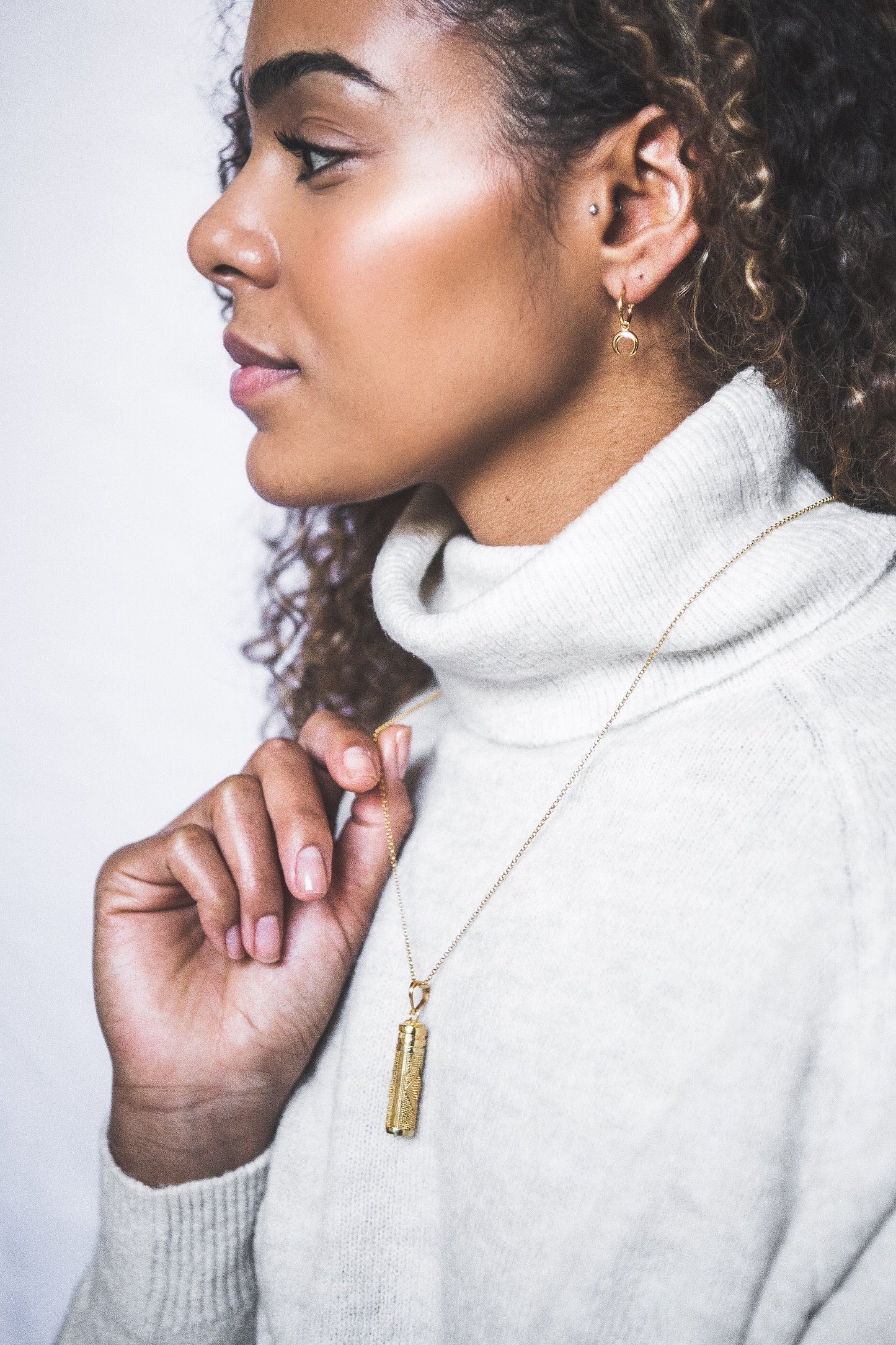 Woman wearing Mini Crescent Hooped Stud earring