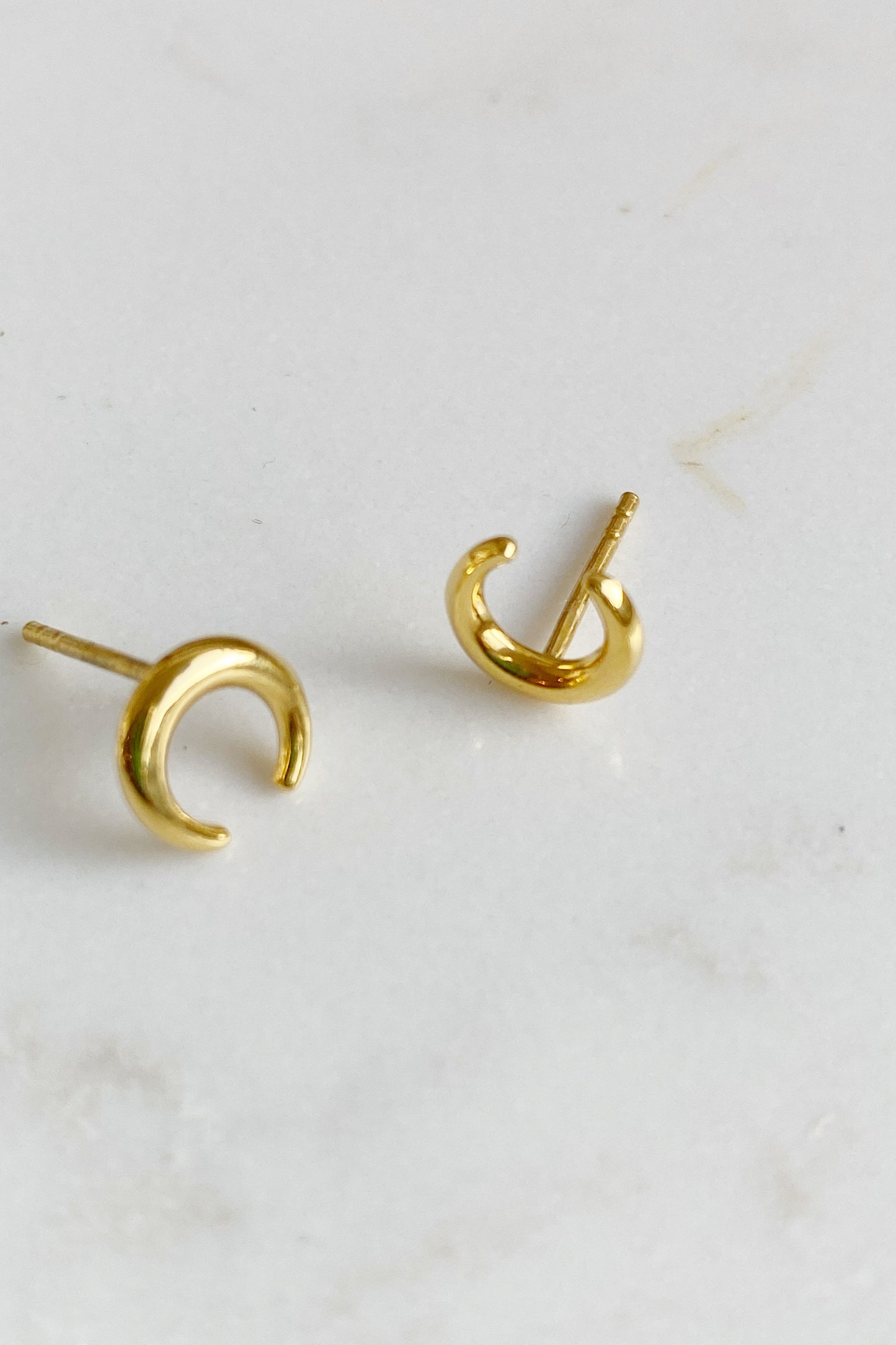 Crescent Studs on a surface