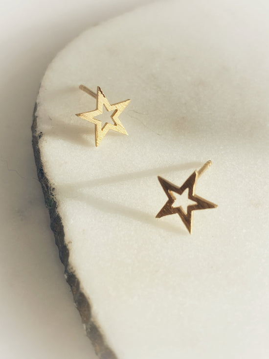 Close up of Small Star Stud earrings