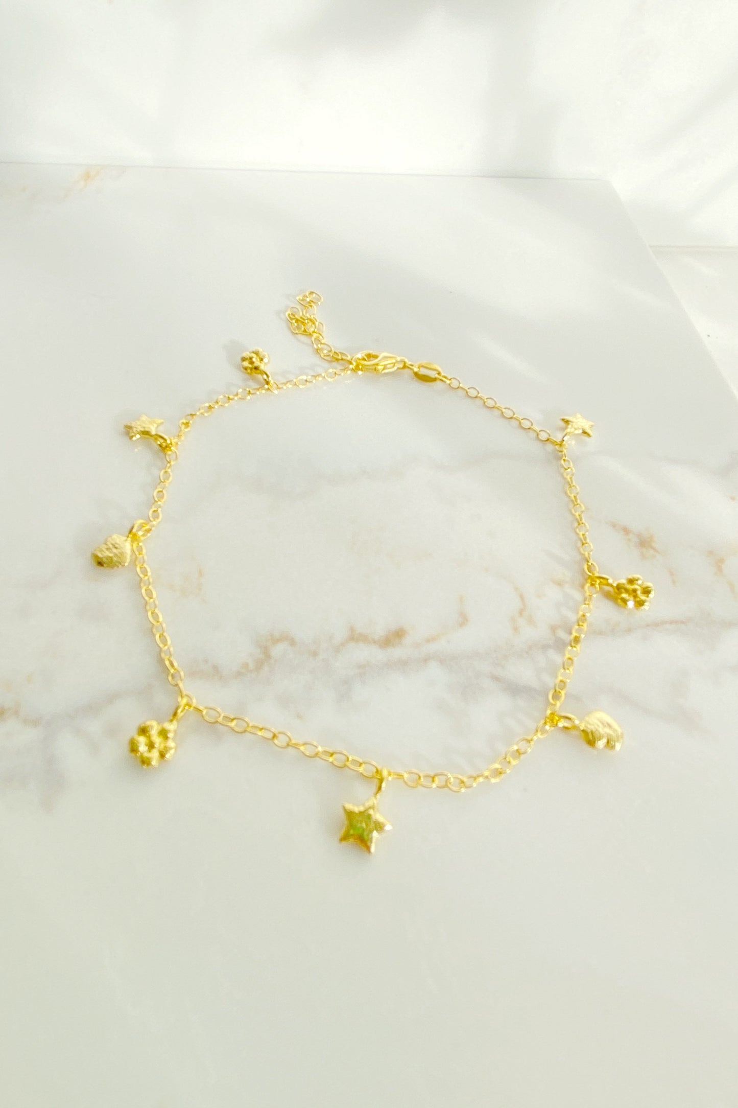 Charm Anklet on a surface