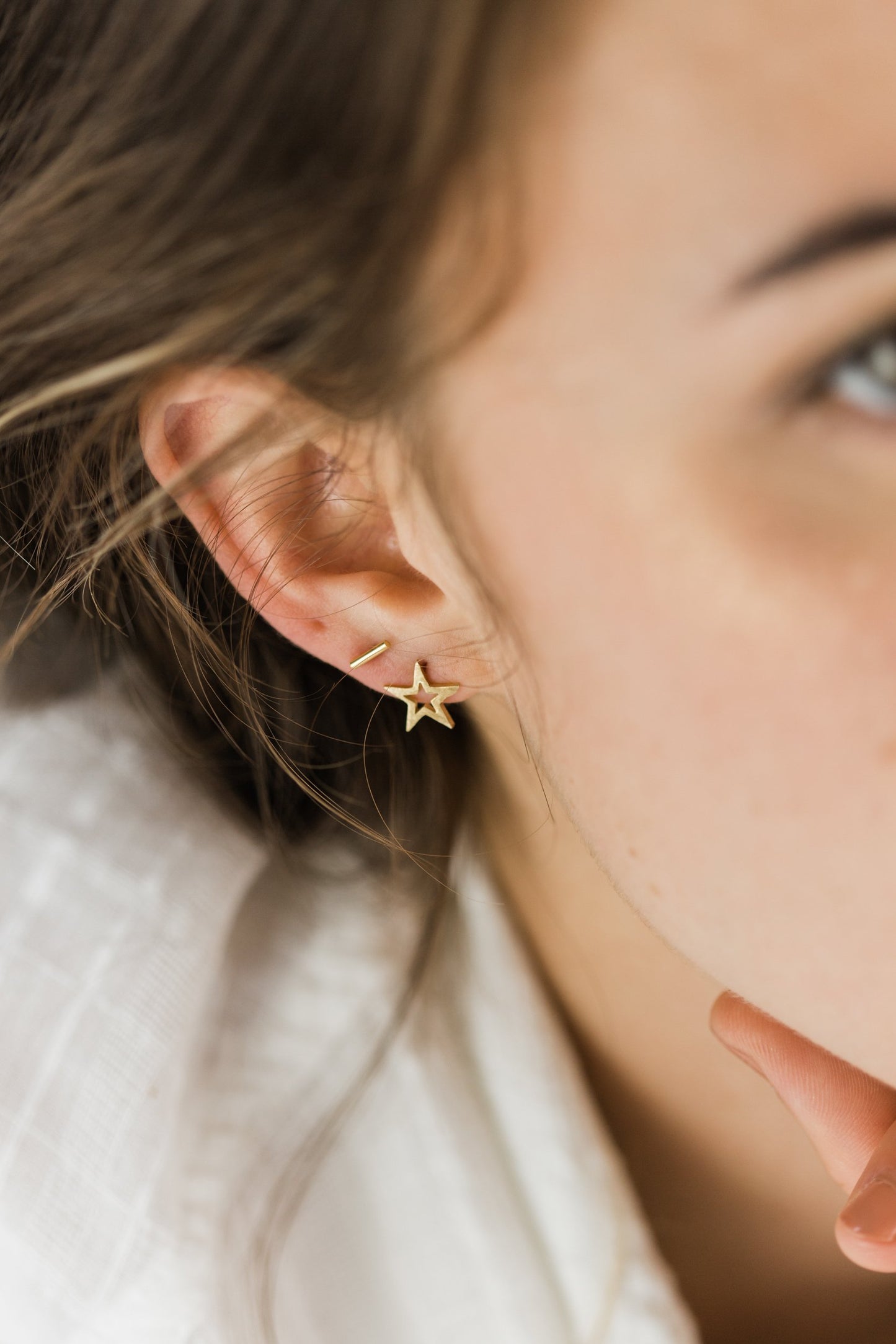 Close up of Small Star Stud earring